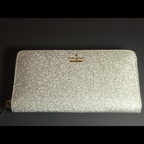 kate spade Handbags - SALE! Kate Spade Silver BC Wallet NWT